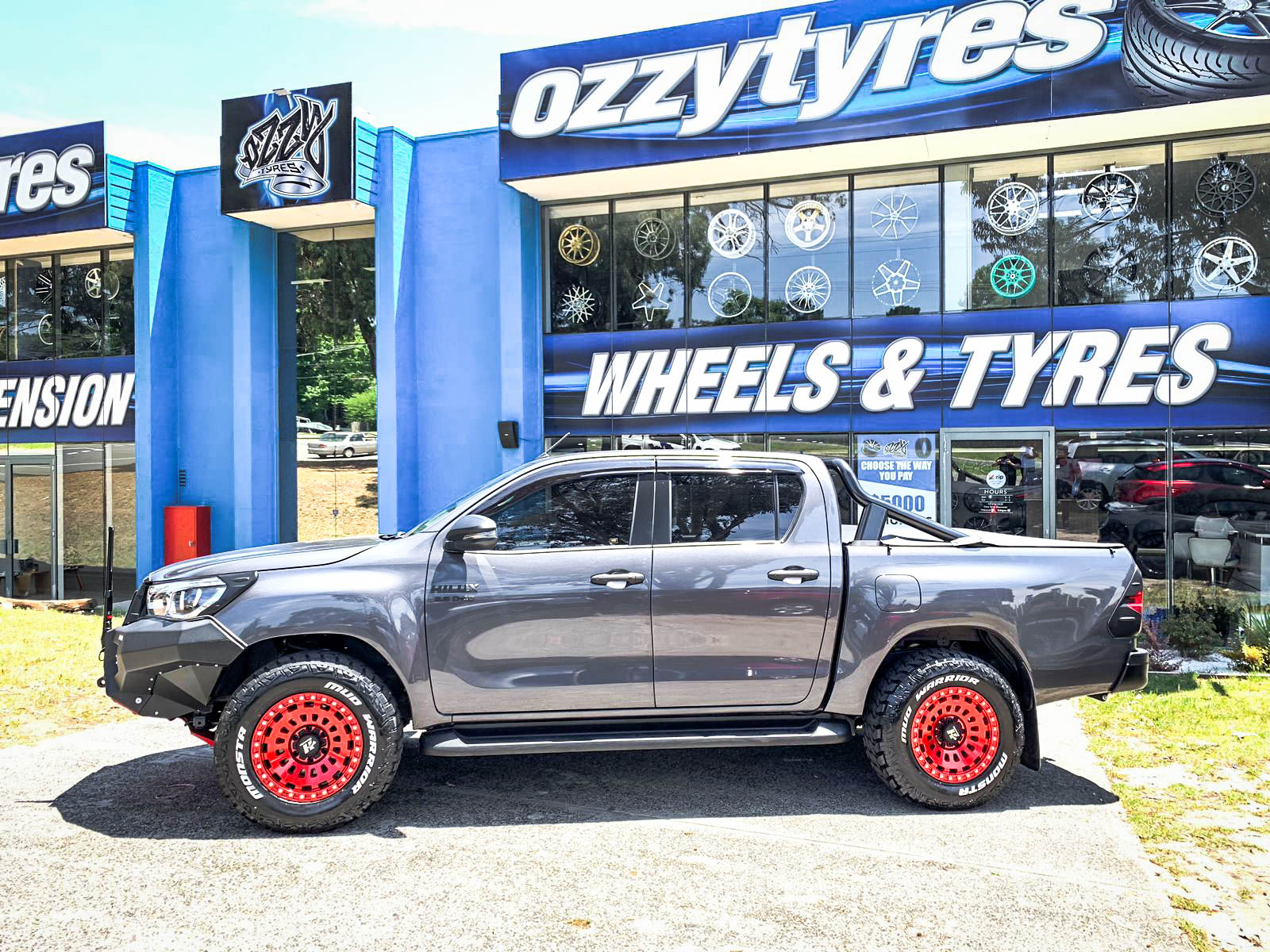 Toyota hilux on hussla strikeforce candy red 1